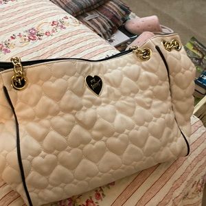 Betsey Johnson Purse with chain detail.